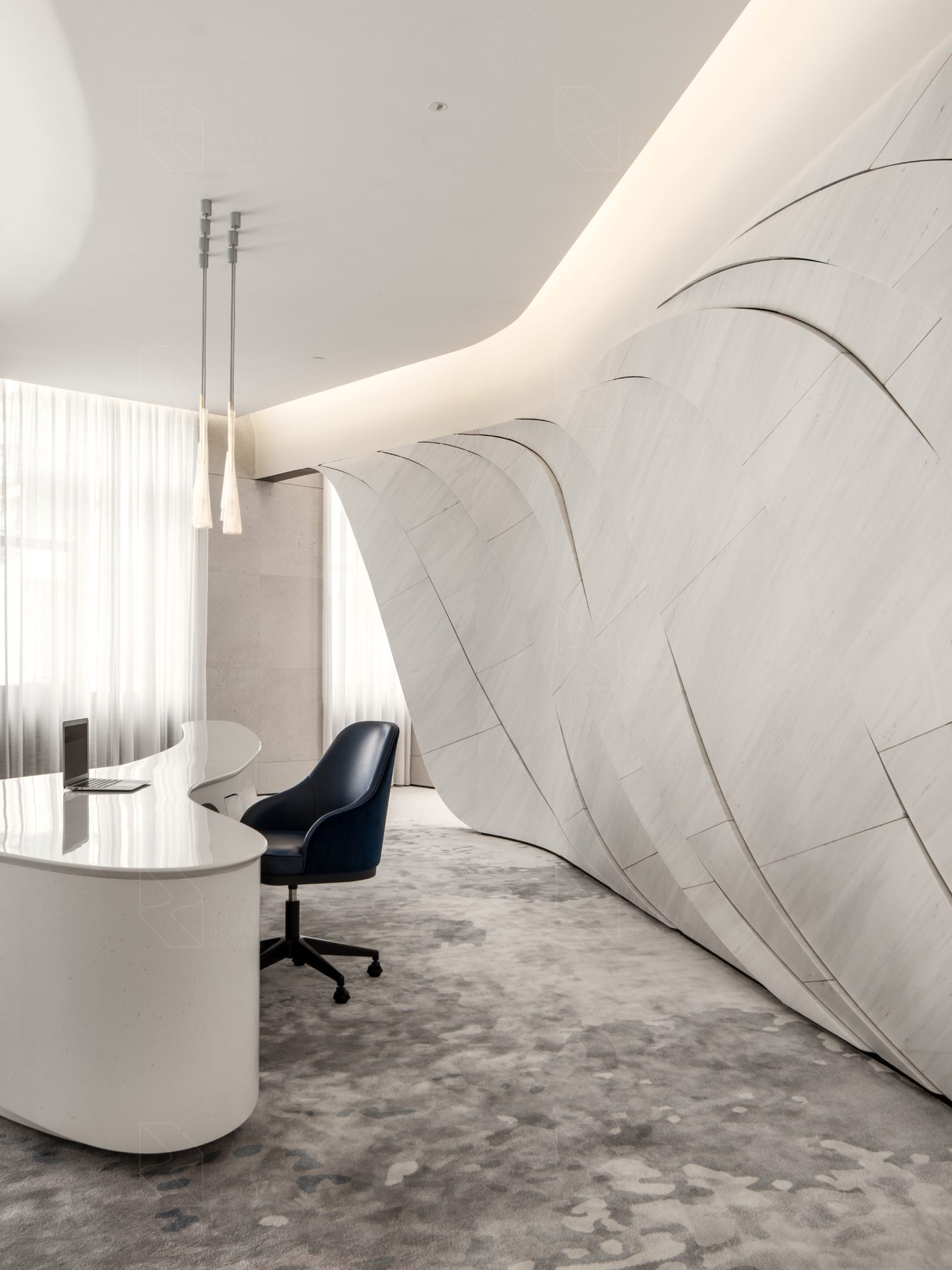 Sculptural curved wall at a private workspace